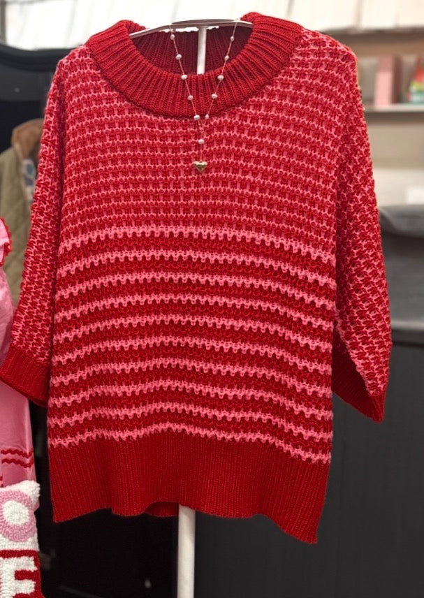 Pink and red mock neck sweater