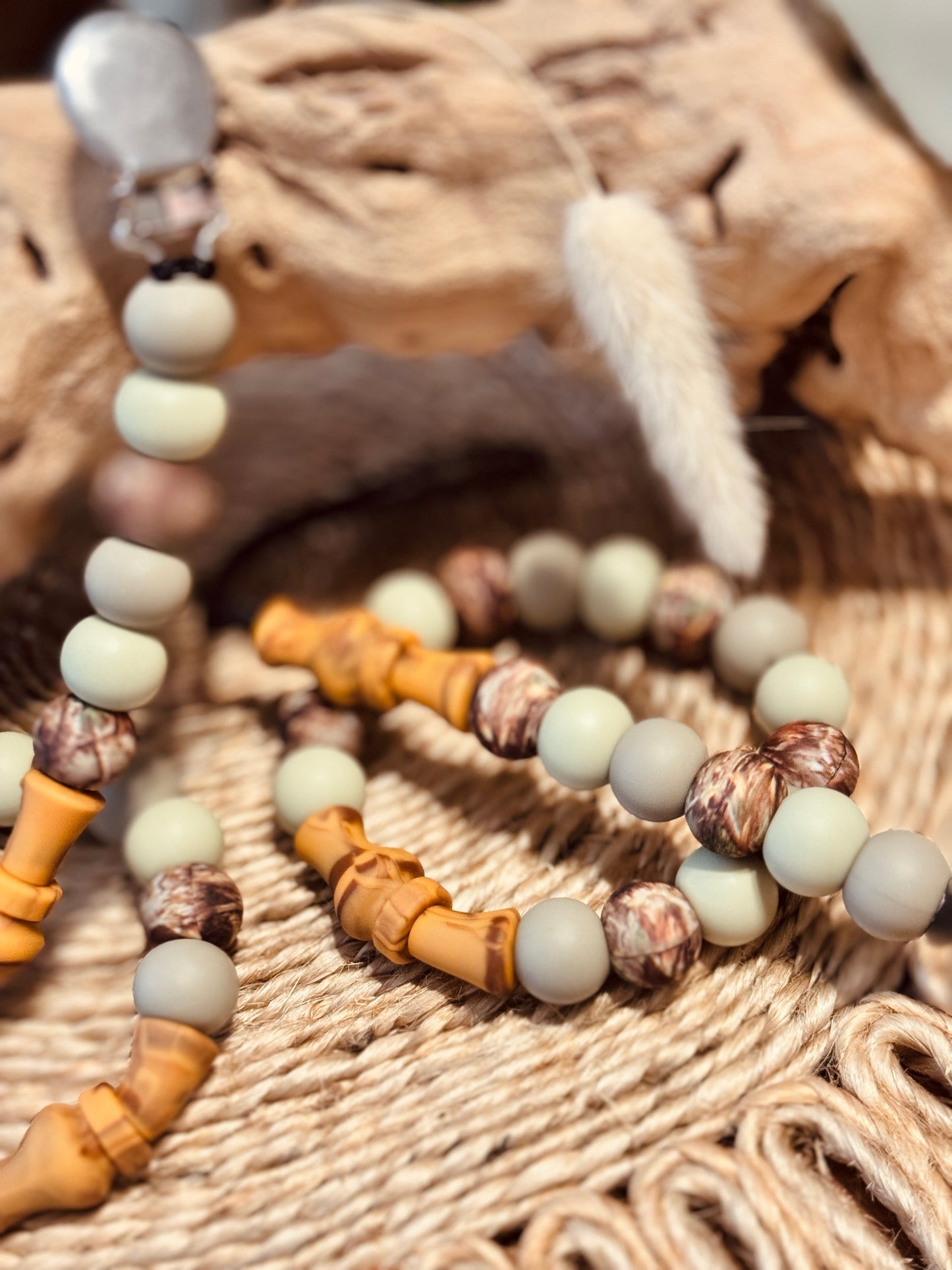 Duck call pacifier clip