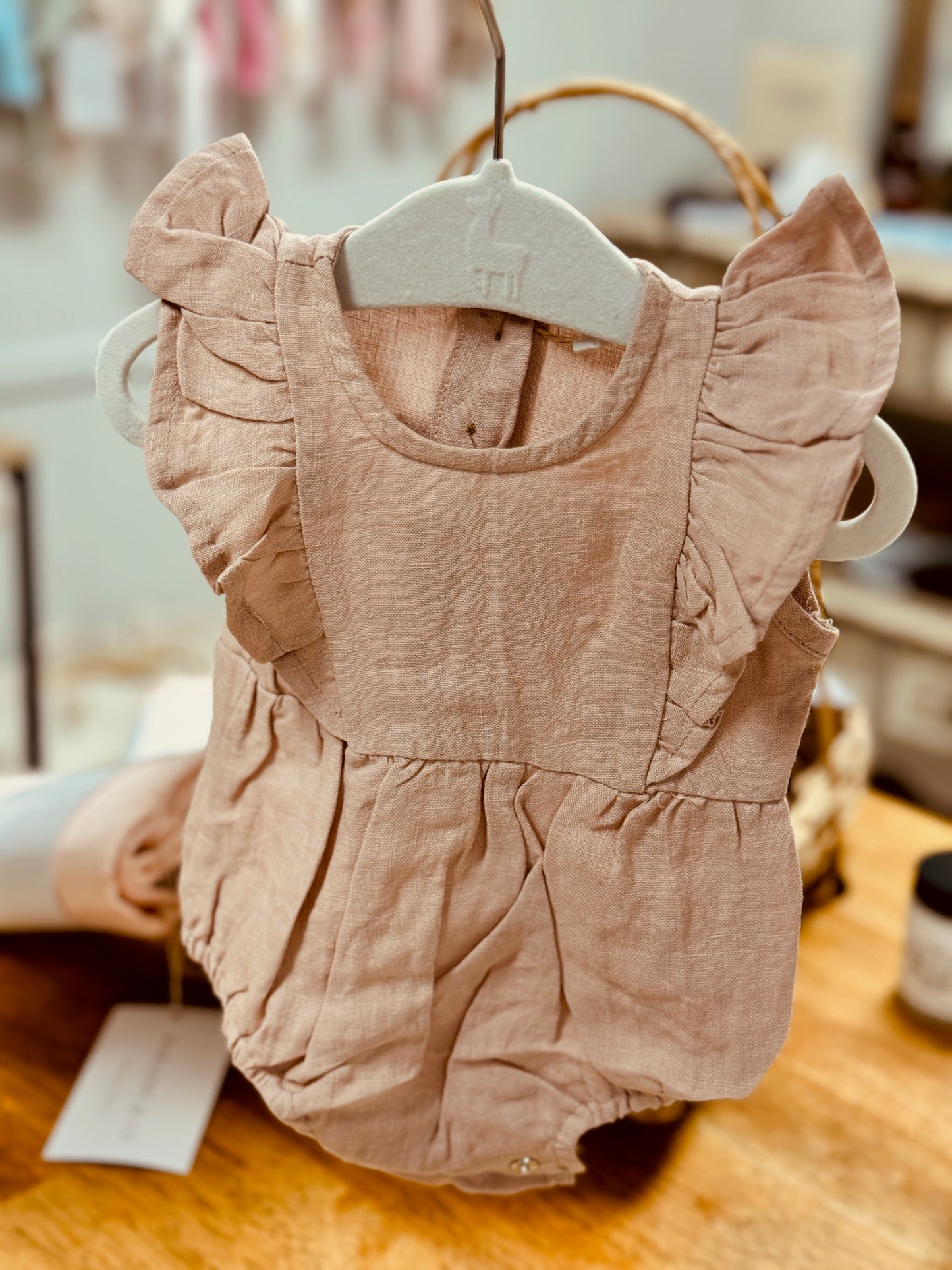 Blush Flutter sleeve romper